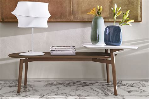 The middle stored glass leaf extends the table in length from 43.9 to 59. Calligaris Match CS/5084-D - Coffee Table