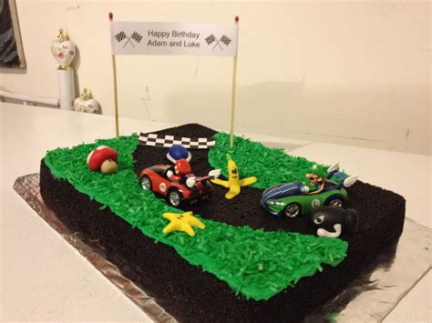 Super mario kart cake with bunting. Adam and Luke's Mario Kart Birthday Cake | Mario birthday ...