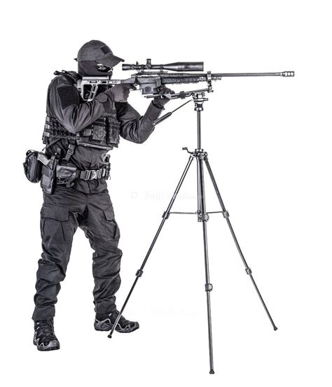 Studio Shoot Of Police Special Forces Sniper In Black Blank Uniform And