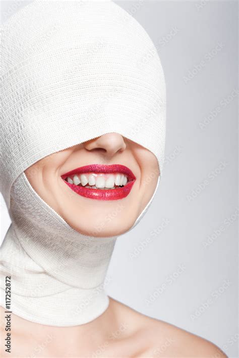 Beautiful Woman After Plastic Surgery With Bandaged Face Stock Photo
