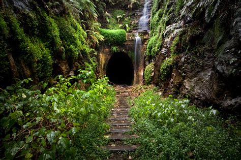 Abandon Tunnel And Waterfall Stock Photo Download Image Now Istock
