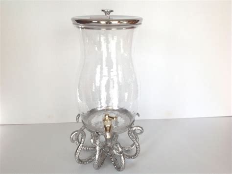 Look at how to make storage unique. POTTERY BARN OCTOPUS DIRNK DISPENSER STAND AND CLASSIC ...