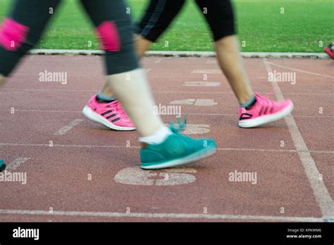 Runners Feet In Motion On Track Stock Photo Alamy