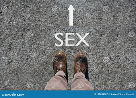 Man`s Shoes View From Above Word Sex And An Arrow Indicating The