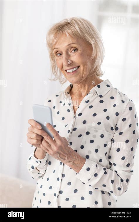 Sincere Mature Woman Getting Message Stock Photo Alamy