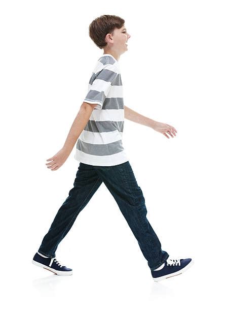 Best Boy Walking Side View Stock Photos Pictures And Royalty Free Images