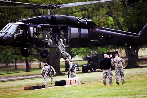 Soldiers Use The Fast Rope Insertion Extraction System From A Uh 60 Black Hawk Helicopter During