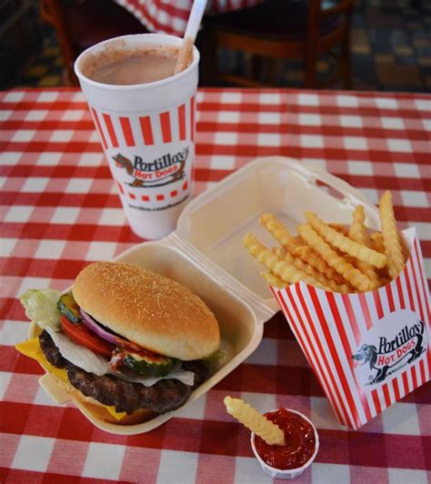 Portillo's is an awesomely great fast food diner in chicago that has the best chocolate cake ever! A Portillo's classic: cheeseburger fries and a chocolate cake shake by portilloshotdogs ...