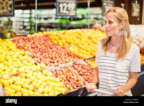 Woman Shopping In Grocery Store Stock Photo Alamy
