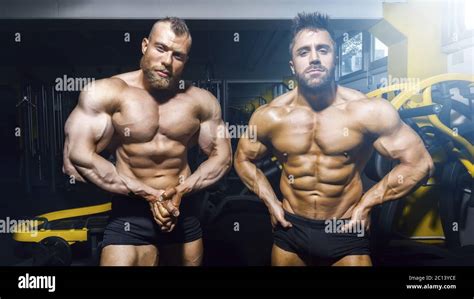 Two Male Bodybuilder Posing At The Gym Stock Photo Alamy