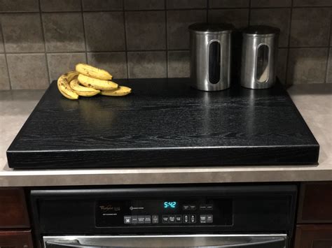 Maybe you would like to learn more about one of these? Black Oak Wooden Stove Top Cover, cooktop burner covers ...