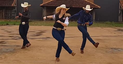 Group Of Country Lovin Line Dancers Flaunt Moves To Redneck Woman