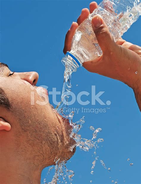 Thirsty Man Drinking Water Stock Photo Royalty Free Freeimages
