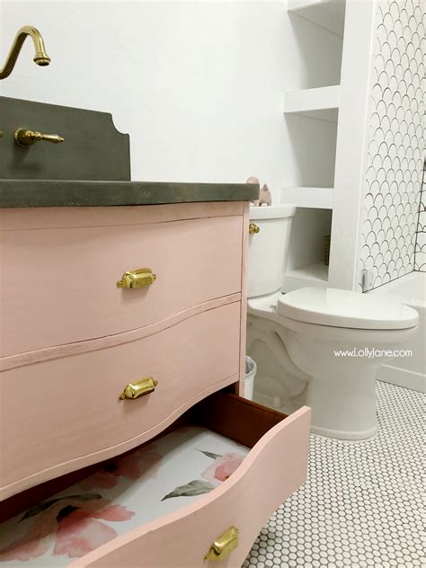 Yellow is brilliant for small wash spaces and packs a real zesty punch! best paint colors for a small bathroom | Behr Paint Color Trends - Lolly Jane