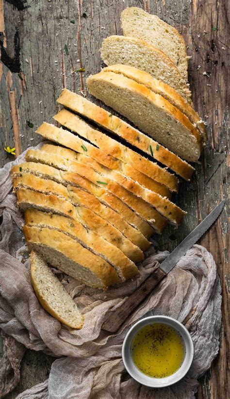 2 cups whole wheat flour, 1 cup bread flour, 9 ounces water, 3 teaspons gluten, 4 tablespoons olive oil, 2 tablespoons sugar, 1.5 teaspoons salt, 3 teaspoons saf yeast, 1 teaspoon dill, 2 teaspoons rosemary, 1 teaspoon majoram. Tuscan Herb Bread | Two Cups Flour