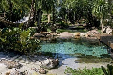 A natural swimming pond looks very cool in your landscape becoming an additional decor feature and it looks absolutely natural integrating into the landscape. 30+ Gorgeous Backyard Swimming Ponds Ideas #backyard # ...