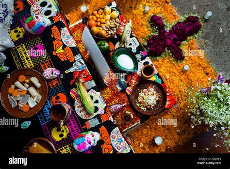 Food Offerings Are Placed At The Altar Of The Dead During The Day Of