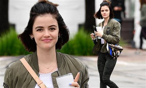 Lucy Hale Flashes A Smile In Camouflage Leggings As She Steps Out For A
