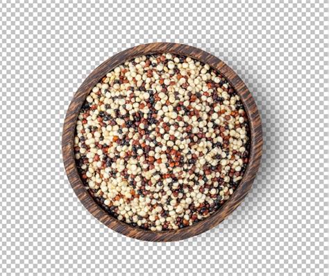 Grão de quinoa em tigela de madeira isolada na camada alfa PSD Premium
