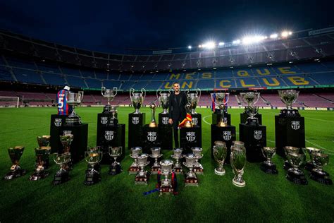 Sergio Busquets Poses With All The Trophies He Won At Barcelona Rsoccer
