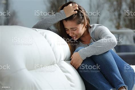 Sad Girl Crying Alone At Home Stock Photo Download Image Now Istock