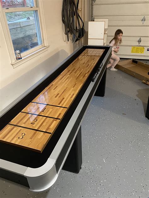 58 mo finance atomic 9 platinum shuffleboard table with poly coated playing surface for