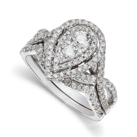 An engagement ring typically has a diamond while a wedding ring is usually more plain. Pear Shaped Engagement Ring Settings - Wedding and Bridal Inspiration