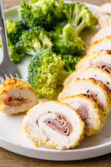 Chicken stuffed with ham and cheese, coated with crunchy golden breadcrumbs. Baked Chicken Cordon Bleu (Paleo-Friendly) | Paleo Grubs