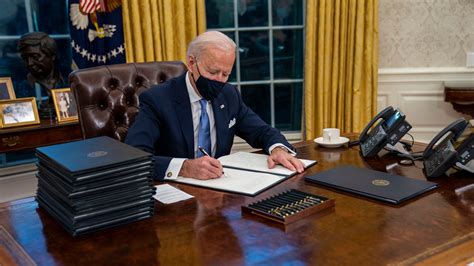 In The Oval Office For The First Time As President Biden Begins To