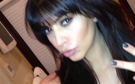 Kim Kardashian Follows In Sister Kourtneys Footsteps As She Shows Off