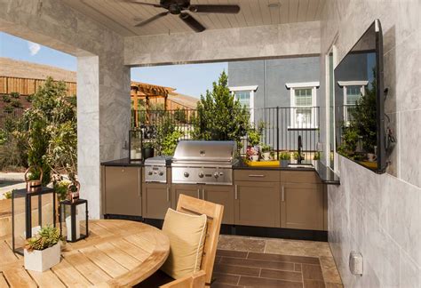 Covering your outdoor kitchen brings indoor comforts outdoors. Outdoor Kitchen Designs