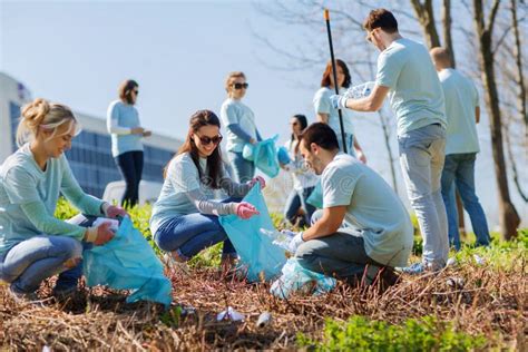 Volunteers With Garbage Bags Cleaning Park Area Stock Image Image Of