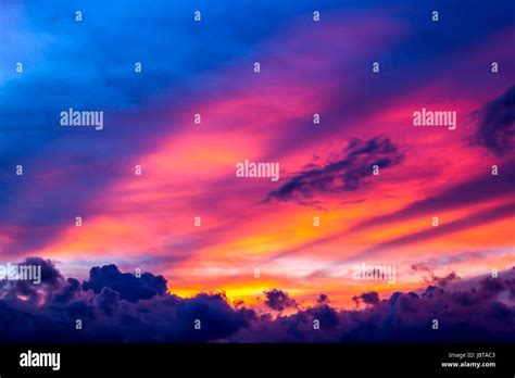 Fiery Orange Sunset Sky And Cloud Background Stock Photo Alamy