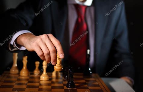 Businessman Playing Chess — Stock Photo © Sergeynivens 8361709