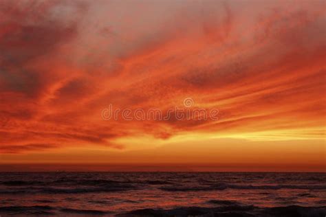 Red Sunset Over The Ocean Stock Photo Image Of Sunset 136658998