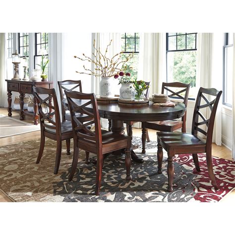 Ashley Furniture Porter Round Dining Room Pedestal Table With Leaf
