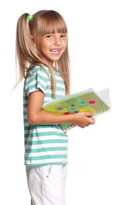 Mała Dziewczynka Z ćwiczenie Książkami Zdjęcie Stock Obraz złożonej z wyrażenie mienie