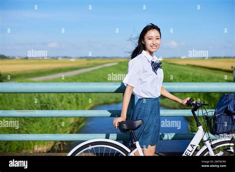 Japanese high school student portrait outdoors Stock Photo - Alamy