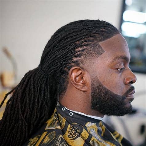 It's a short frohawk accented with golden tips. Hairstyles for Black Men with Long Hair (Trending in ...