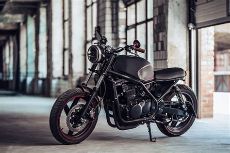 Motorcycle design varies greatly to suit a range of different purposes: Modern Black Motorcycle Stock Photo - Download Image Now ...