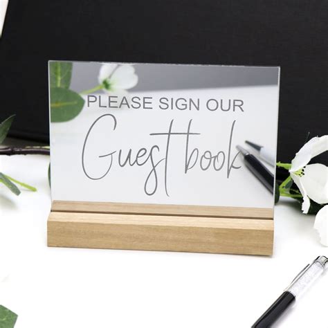 Set this elegant wedding guest book and pen out at your reception for guests to write their best wishes to the happy. Mirror Silver Guest Book Sign - Acrylic with Timber Base ...