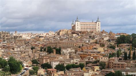 Mesmerizing Shot Of A Beautiful Cityscape And Ancient Castle Of Toledo