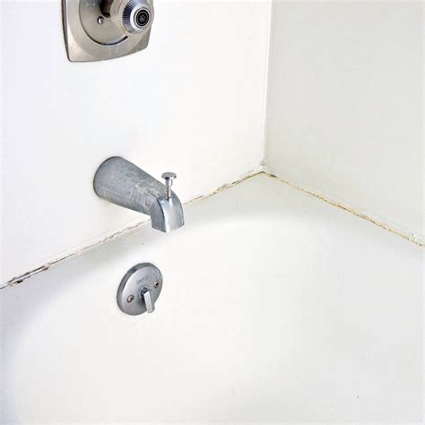 How to caulk around your bathtub. How to Caulk Around a Bathtub | POPSUGAR Smart Living