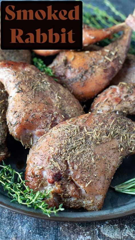 Smoked Rabbit On A Plate With Rosemary Sprigs