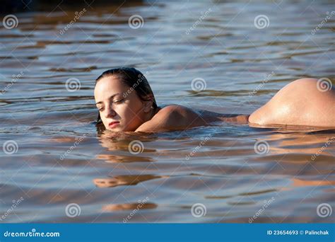 Nude Woman Lying In Water Stock Image Image Of Belly