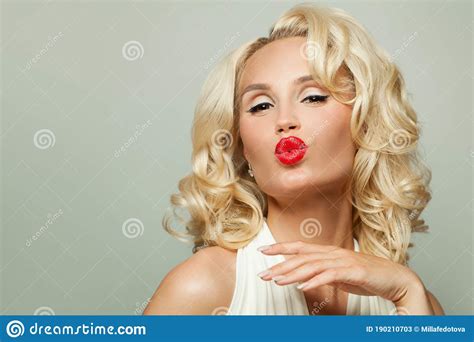 Celebrity Beauty Woman Blowing Kiss On White Fashion Portrait Red
