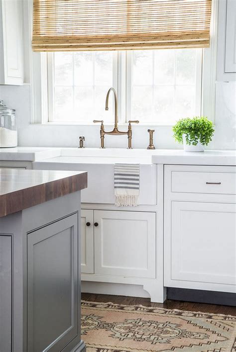 Decorator's white is one of the top ten best kitchen cabinet paint colors for a reason. Renovated Home with Coastal Interiors - Home Bunch - An ...