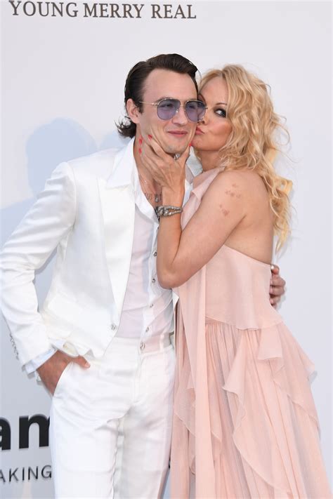 Pamela Anderson Showers Her Son Brandon Lee With Kisses During A Rare Mother Son Appearance In