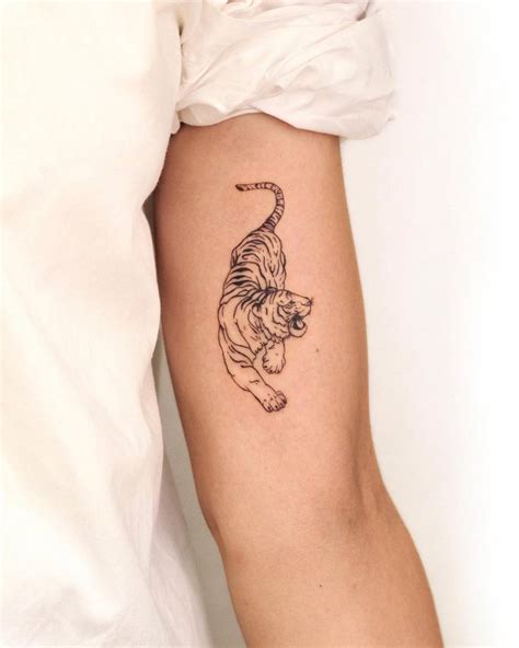 Tiger Tattoo Located On The Inner Arm