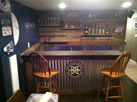 There is nothing attaching the basement bar to the wall at this point, so be careful not to tip the next i added 1×8's of pine to the bottom of the bar, and i used wood glue and finish nails to adhere the trim. Rustic Basement Ideas Diy Corrugated Metal Luxury Pallet ...